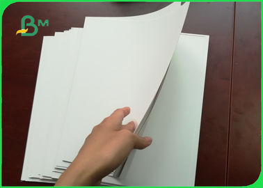 What is the difference between coated art paper and white cardboard?